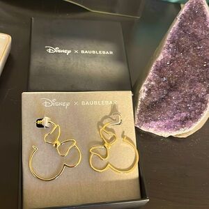 Minnie Mouse earrings.